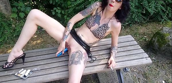  Lucy Ravenblood smoking and diloing her pussy in a public park